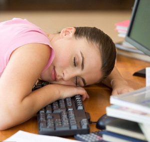 girl sleeping on keyboard